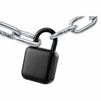 A black electronic padlock with a square body and shackle, shown locked onto a silver metal chain against a plain white background.